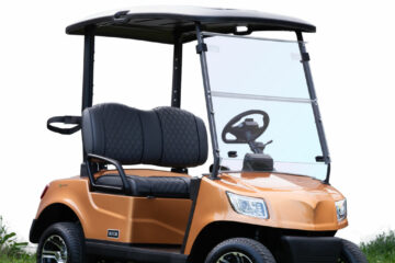 Orange Gold golf car on white background